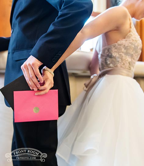 Couple Exchanging cards before the wedding